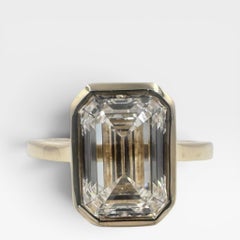 14k Yellow Gold Solitaire Ring with 3.07Ct. Lab Grown Emerald Cut Diamond.