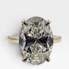 14k Yellow Gold Solitaire Ring with 4.51 Ct. Lab Grown Oval Cut Diamond.