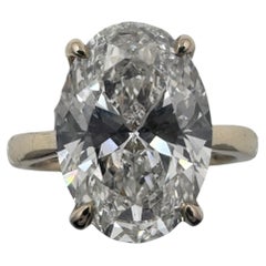 14k Yellow Gold Solitaire Ring with 4.51 Ct. Lab Grown Oval Cut Diamond.