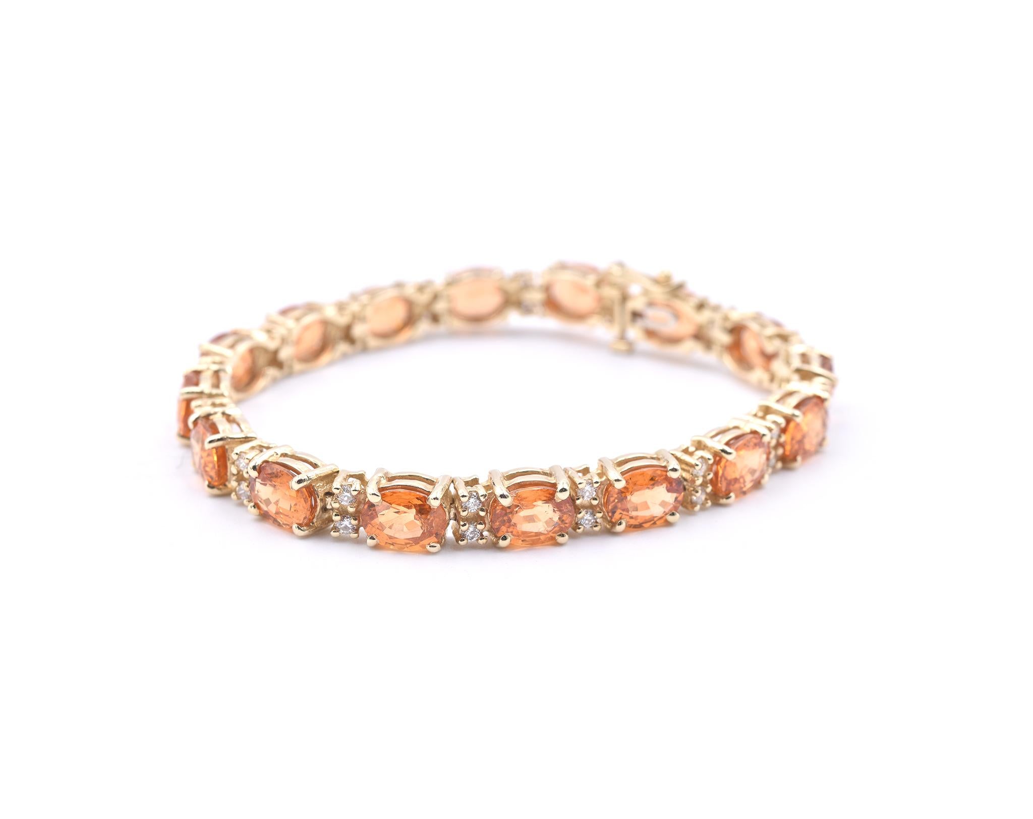 Designer: Custom
Material: 14k yellow gold
Garnets: 16 oval garnets = 27.75ct 
Diamonds: 32 round brilliant cuts = .91cttw
Dimensions: bracelet is 7-inches in length and 6.25mm in width
Weight: 22.74 grams
