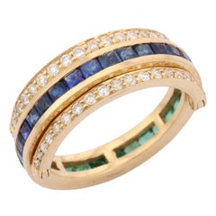 14K Yellow Gold Spinner Ring in Sapphire, Emerald and Diamond.