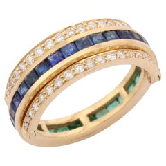 14K Yellow Gold Spinner Ring Studded with Sapphire, Emerald and Diamond