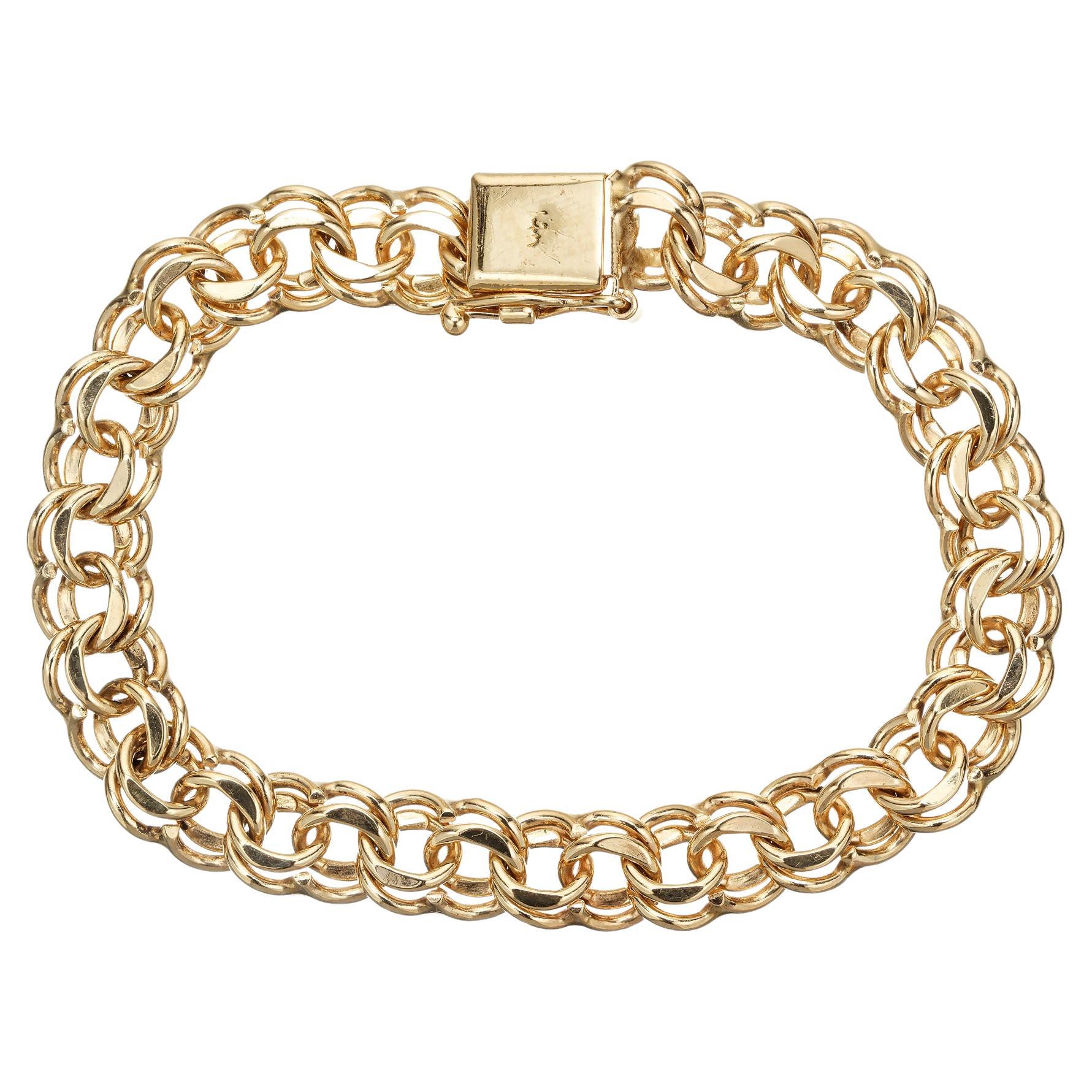 Klassische Mitte der 1960er Jahre 14k Gelbgold 9mm breite doppelte Link-Konstruktion, so dass es ein perfektes Accessoire für beide lässig und formelle Anlässe. Mit seinem stabilen Verschluss, der eine Länge von 7,75 Zoll hat, sorgt dieses Armband