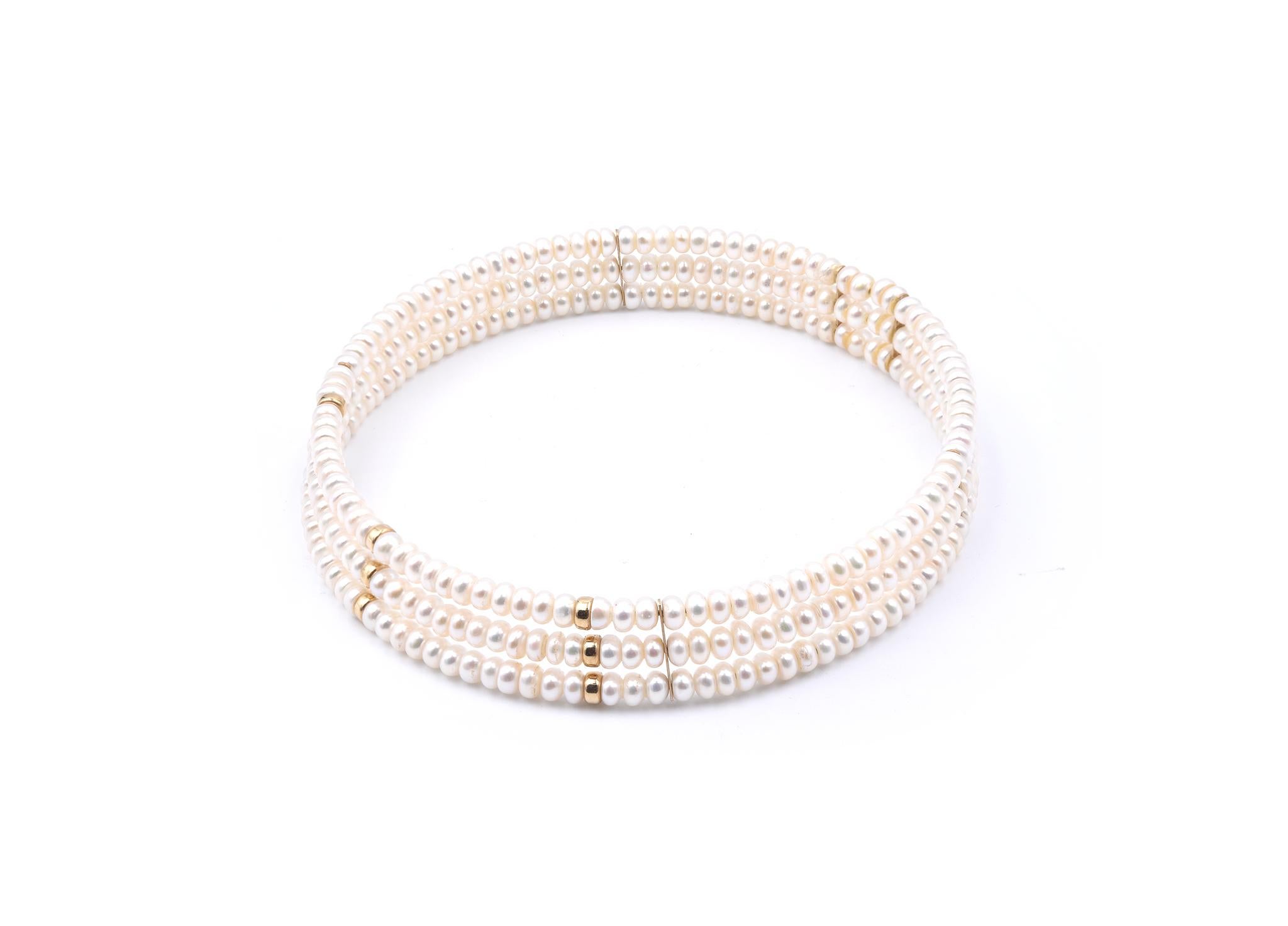 Designer: custom design
Material: 14k yellow gold
Dimensions: pearl necklace measures 12 inches in length
Weight: 47.42 grams
