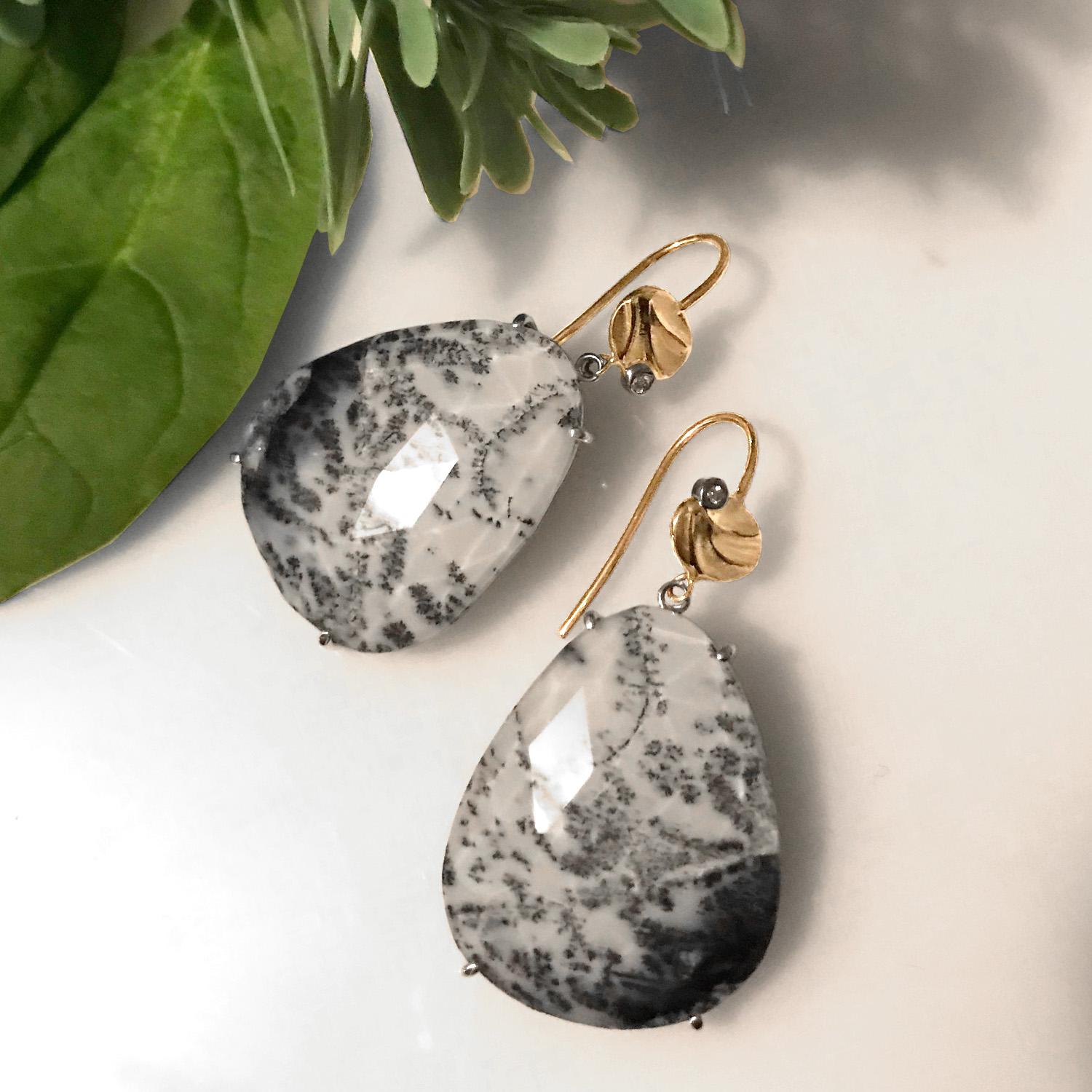 K.Mita's contemporary Vermont Earrings, which are made from 14 Karat Yellow Gold (Upper elements) and Sterling Silver wire (Dendritic Opal settings), feature 52 carat painter-like Dendritic Opals (with faceted clear Quartz) accented with 0.02 Carat