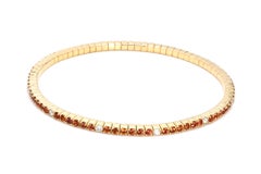 Pulsera elástica de oro amarillo de 14 quilates engastada con diamantes naturales y zafiro naranja