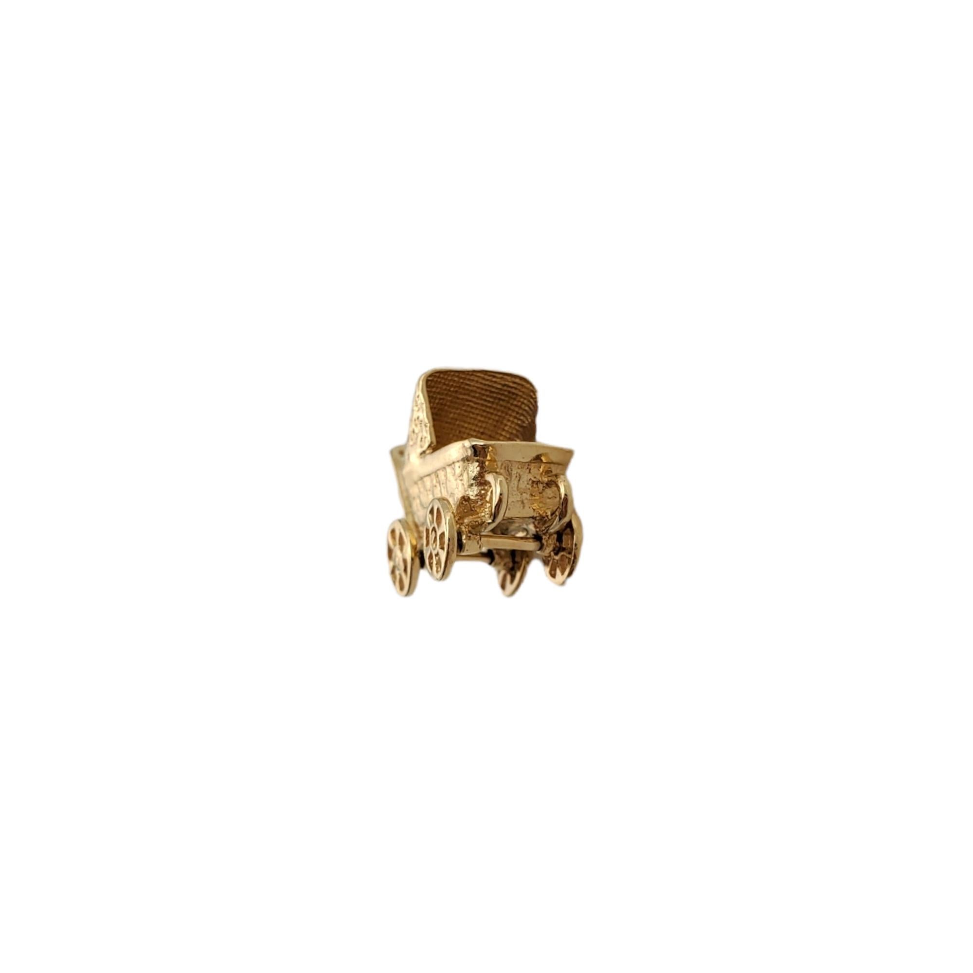 Vintage 14K Yellow Gold Stroller Charm 

Beautiful yellow gold stroller charm! 

Size: 7.86mm X 16.58mm

Weight:  2.1gr /  1.3dwt

Very good condition, professionally polished.

Will come packaged in a gift box and will be shipped U.S. Priority Mail