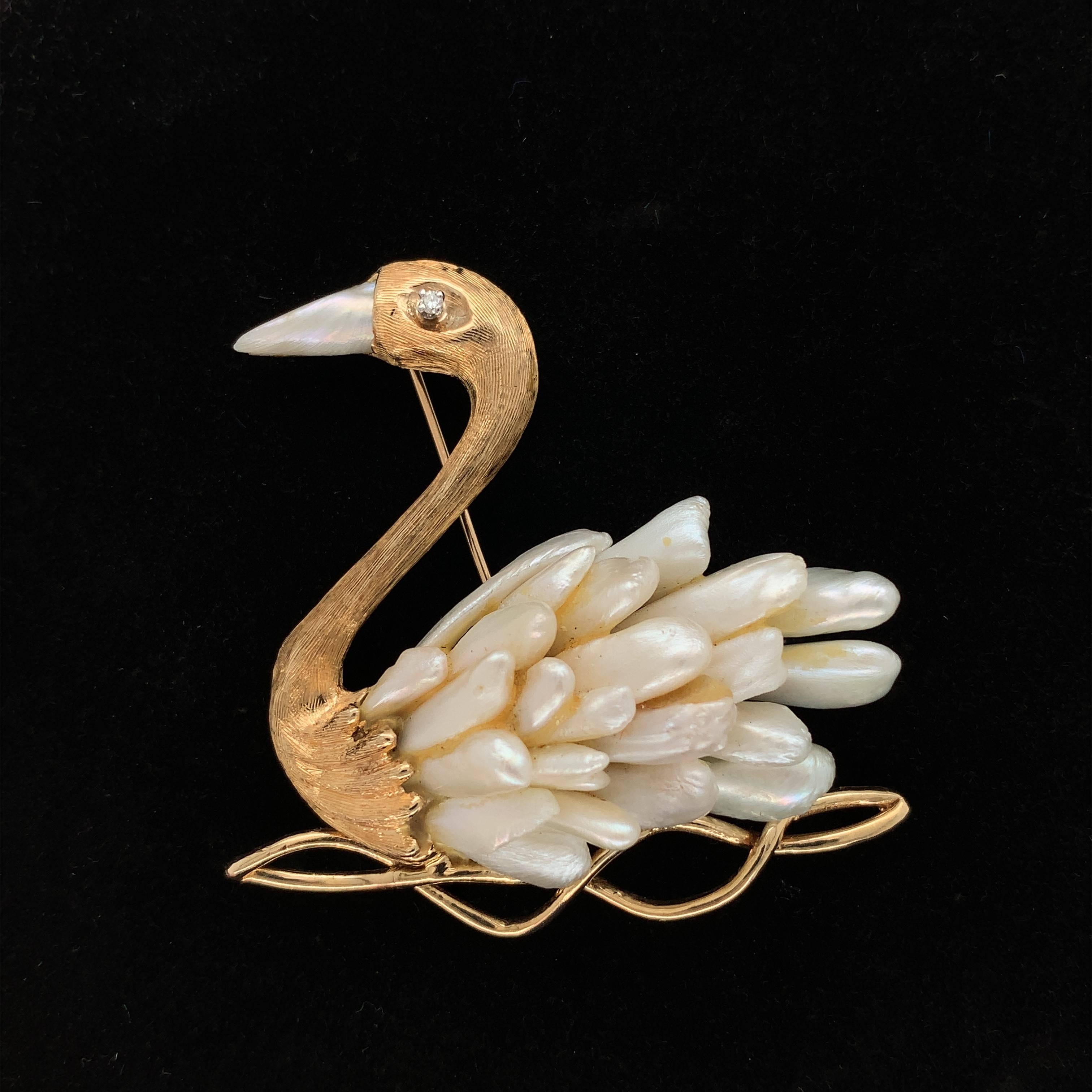 14K yellow gold swan pin with freshwater Mississippi river pearls. The pin measures 1 7/8