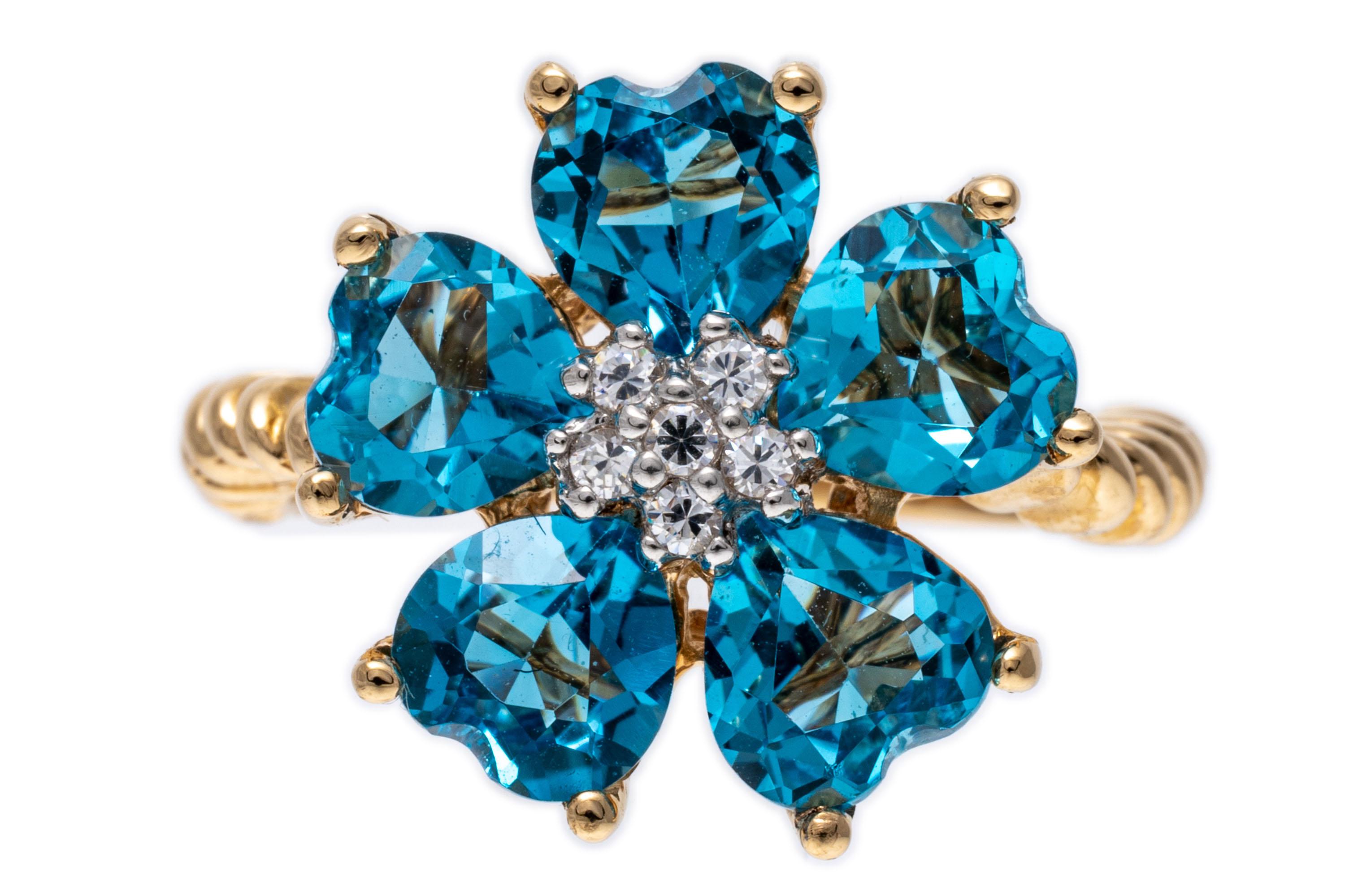 Bague en forme de fleur en or jaune 14 carats avec topaze bleue suisse en vente 4