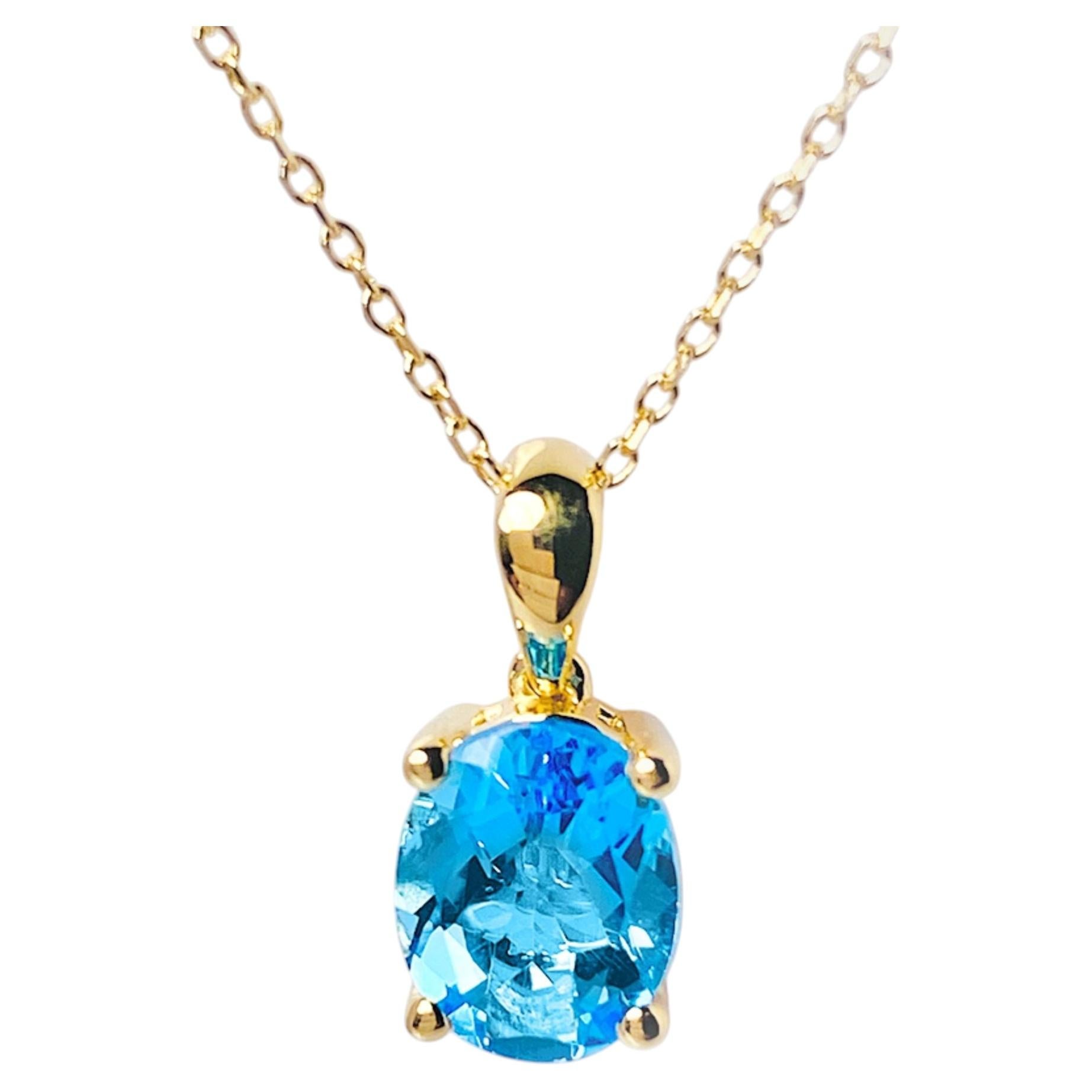 14K Yellow Gold Swiss Blue Topaz Oval Cut Solitaire Pendant