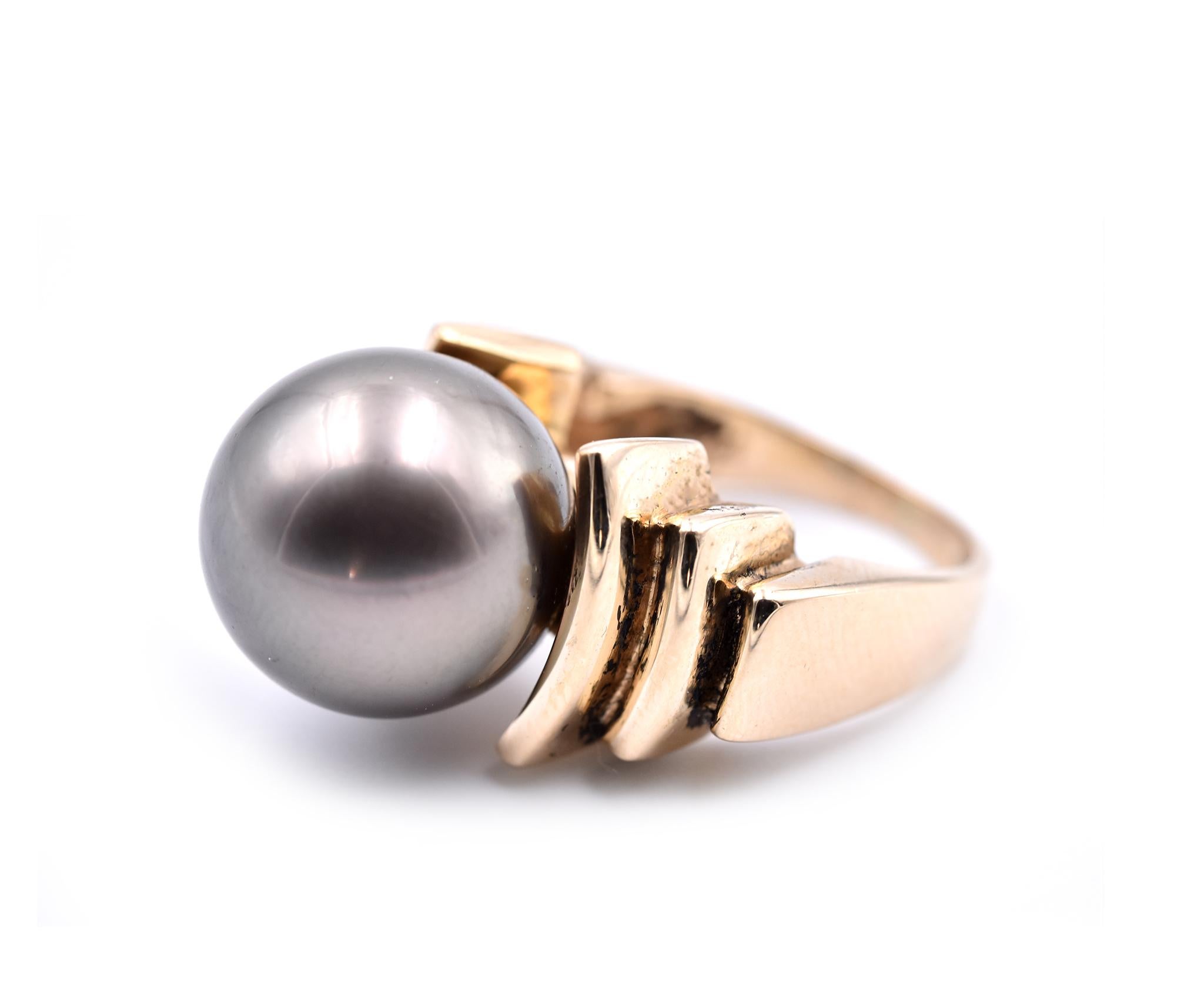 Designer: custom design
Material: 14k Yellow Gold
Pearl: Tahitian pearl
Ring Size: 5 1/2 (please allow two additional shipping days for sizing requests)
Dimensions: ring measures 33.22mm in height and 23.02mm in width
Weight: 12.23 grams
