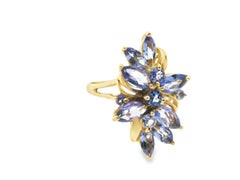 Anillo en racimo de tanzanita de oro amarillo de 14k