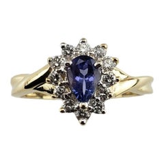 Anello in oro giallo 14K con tanzanite e diamanti misura 6,25 #16353