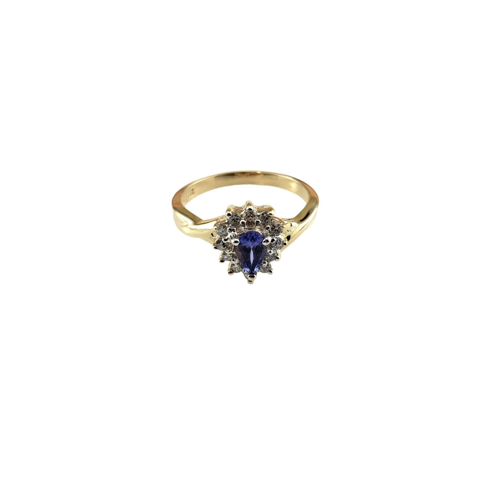 Vintage 14K Yellow Gold Tanzanite and Diamond Ring Size 6.25 

This stunning ring features one pear shaped tanzanite stone (5.8 mm x 3.6 mm) surrounded by 12 round brilliant cut diamonds set in classic 14K yellow gold.  Width: 10 mm.  Shank: 2