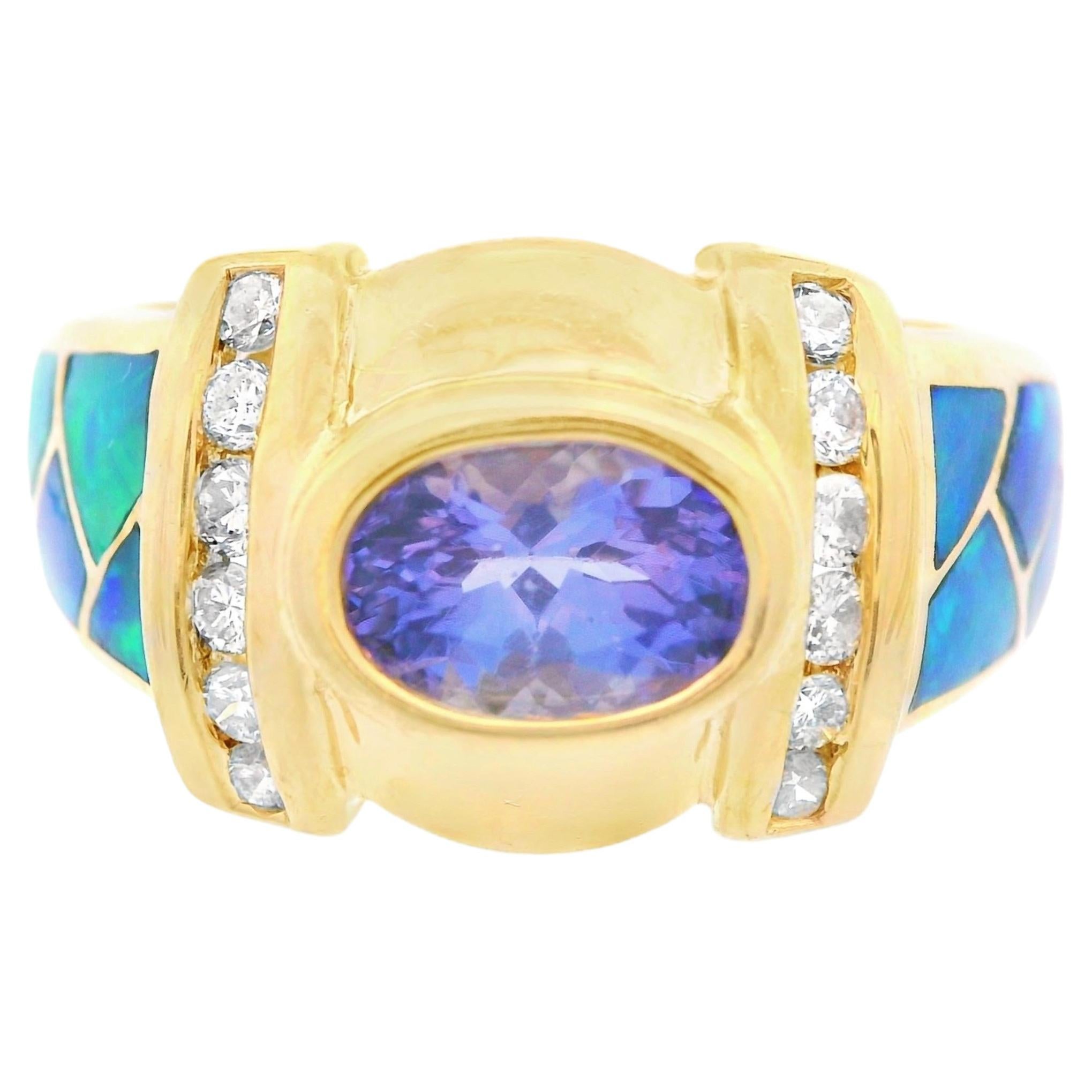 Ring aus 14 Karat Gelbgold mit Tansanit, Intarsien aus Opal und Diamant