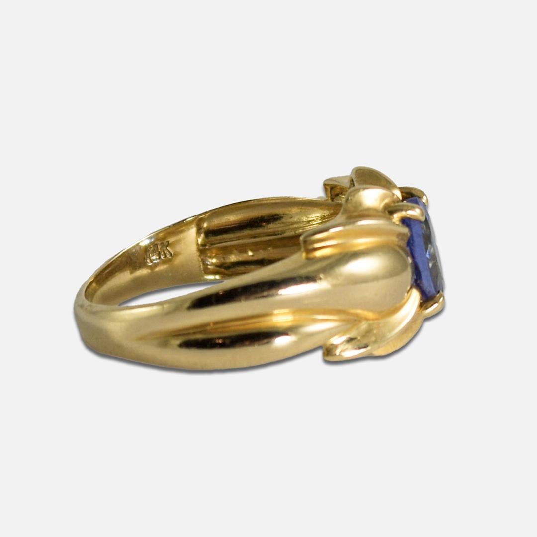 Ladies' Tanzanite ring in 14K yellow gold.
Stamped 14k and weighs 3.5 grams.
The oval-shaped tanzanite is a medium violet-blue color, with 1.00 carat.
There are tiny abrasions on the facet junctures.
The ring measures 11 wide at the top.
The ring