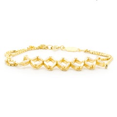 Bracelet à maillons en or jaune 14 carats avec diamants baguettes effilés