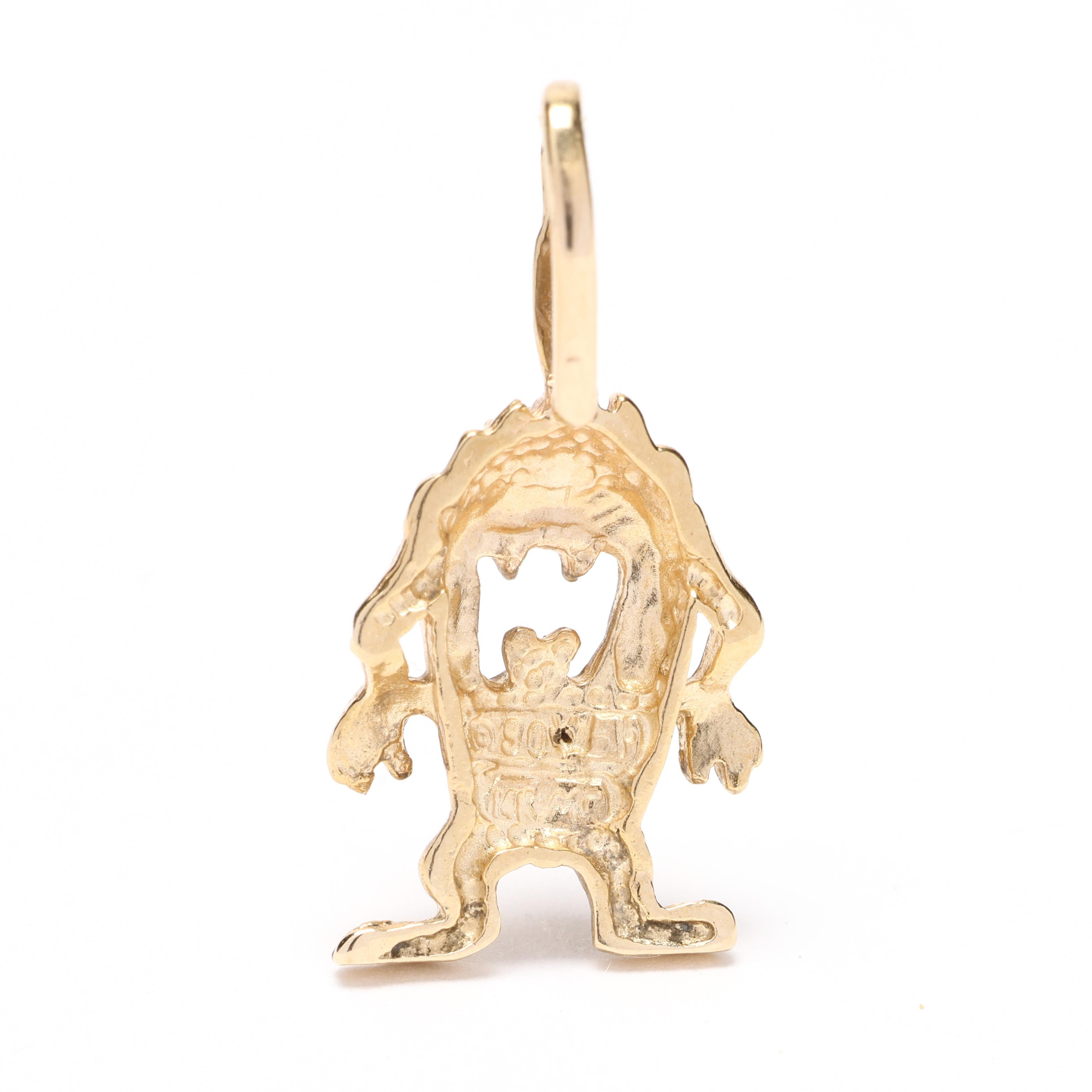 This 14k yellow gold Tazmanian Devil pendant is a nostalgic piece that pays tribute to the beloved 1990s Looney Toons cartoons. Crafted with high-quality gold, this charm features intricate detailing that brings Tazmanian Devil to life. The pendant
