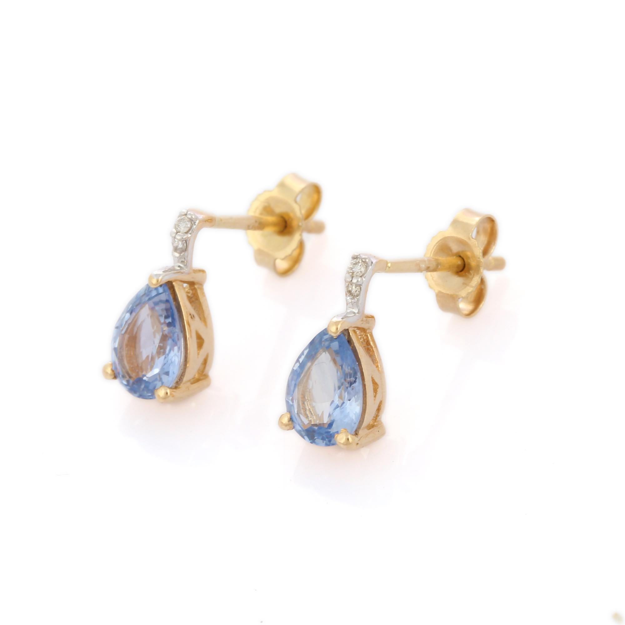 Drop earrings create a subtle beauty while showcasing the colors of the natural precious gemstones and illuminating diamonds making a statement.

Oval cut blue sapphire drop earrings in 14K gold. Embrace your look with these stunning pair of