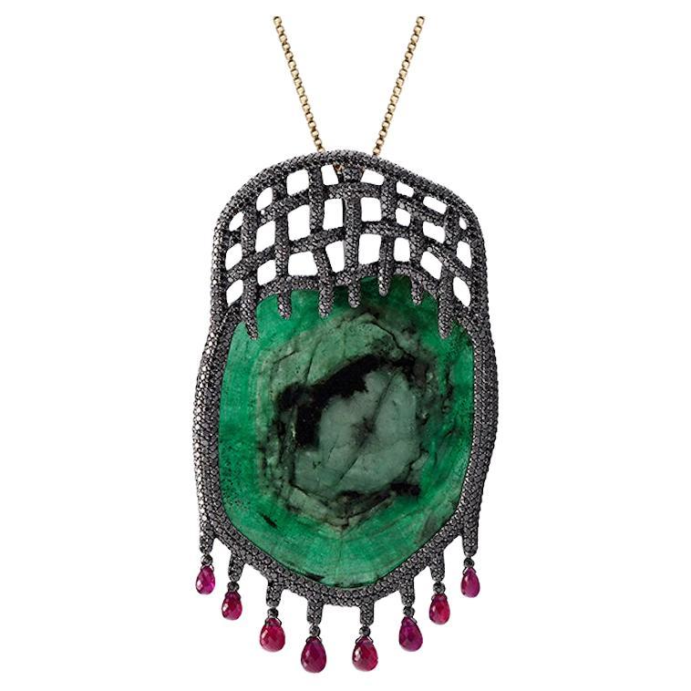 14K Yellow Gold Tender Trap Pendant with Emeralds, Black Diamonds and Rubies For Sale
