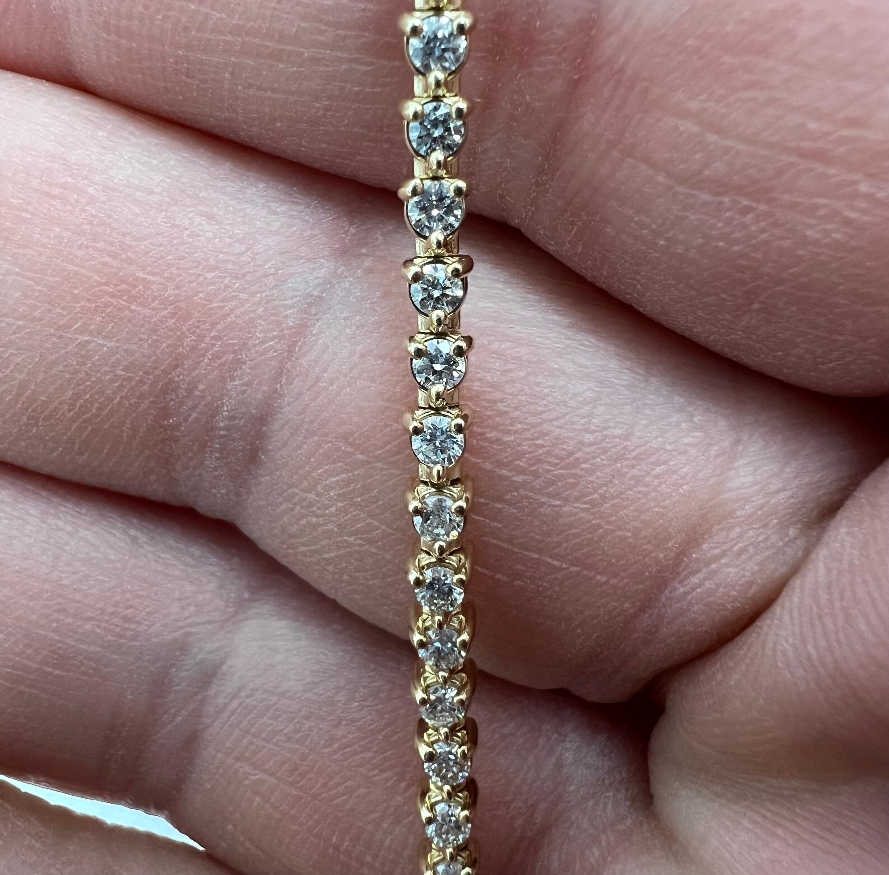 14k Yellow Gold Tennis Bracelet with 2.10 CT of Natural Full Cut Diamonds in a 3 prongs setting.
Classic, high quality, perfect for every occasion.
Natural Full Cut Diamonds 
14k Yellow Gold
3 prongs setting
Number of Diamonds: 58
Total Diamonds