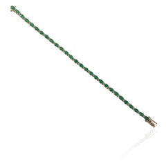 14k Yellow Gold Tennis Bracelet Featuring 6.01 Carat Emerald with Diamonds