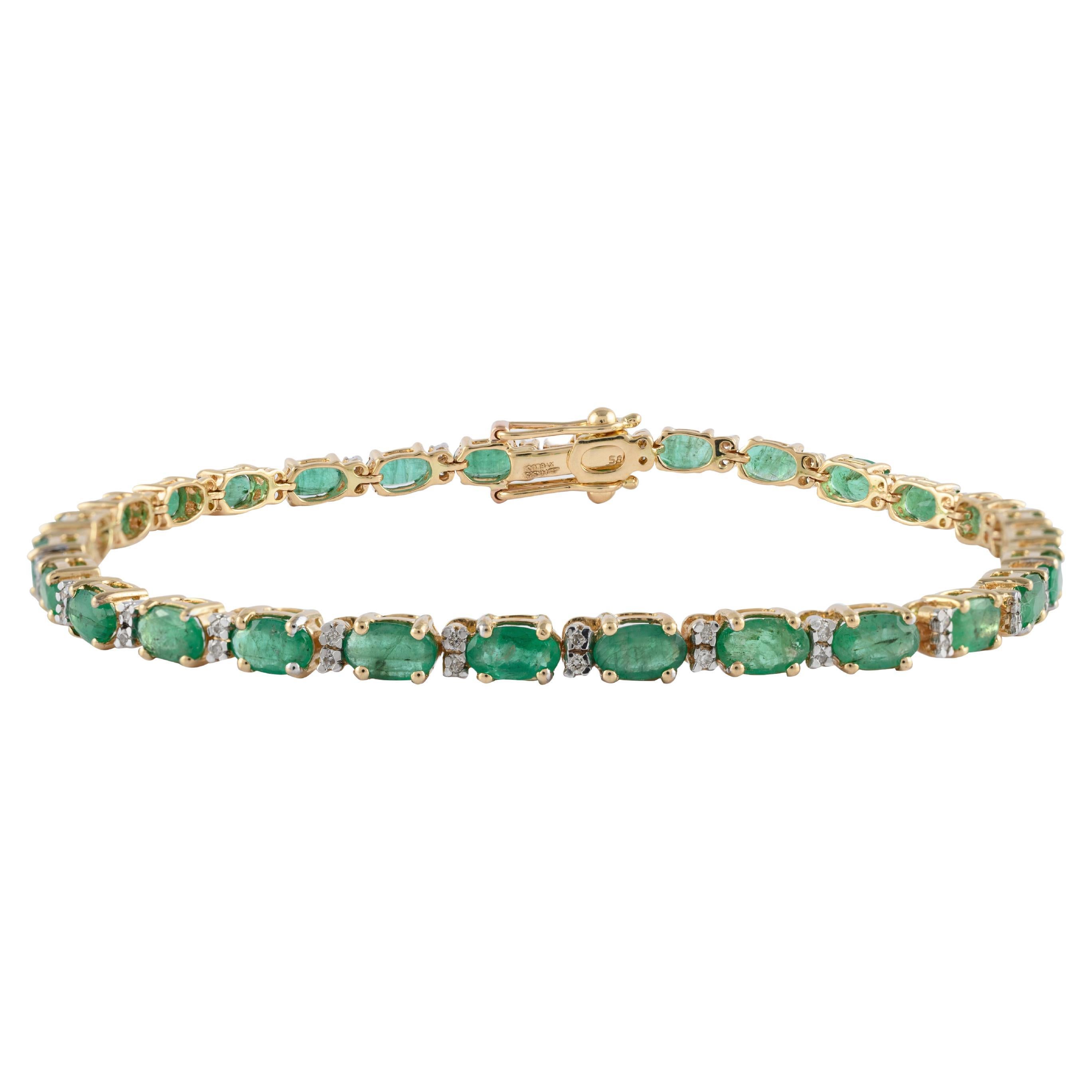 14k Yellow Gold Tennis Bracelet Featuring 6.01 Carat Emerald with Diamonds