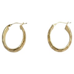 14K Yellow Gold Textured Band Oval Hoop Earrings #21644
