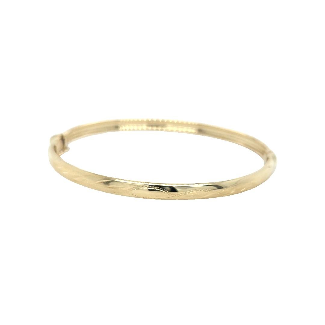 Women's 14K Yellow Gold Textured Bangle Bracelet For Sale