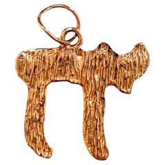 Colgante Chai texturizado de oro amarillo de 14 quilates #20539