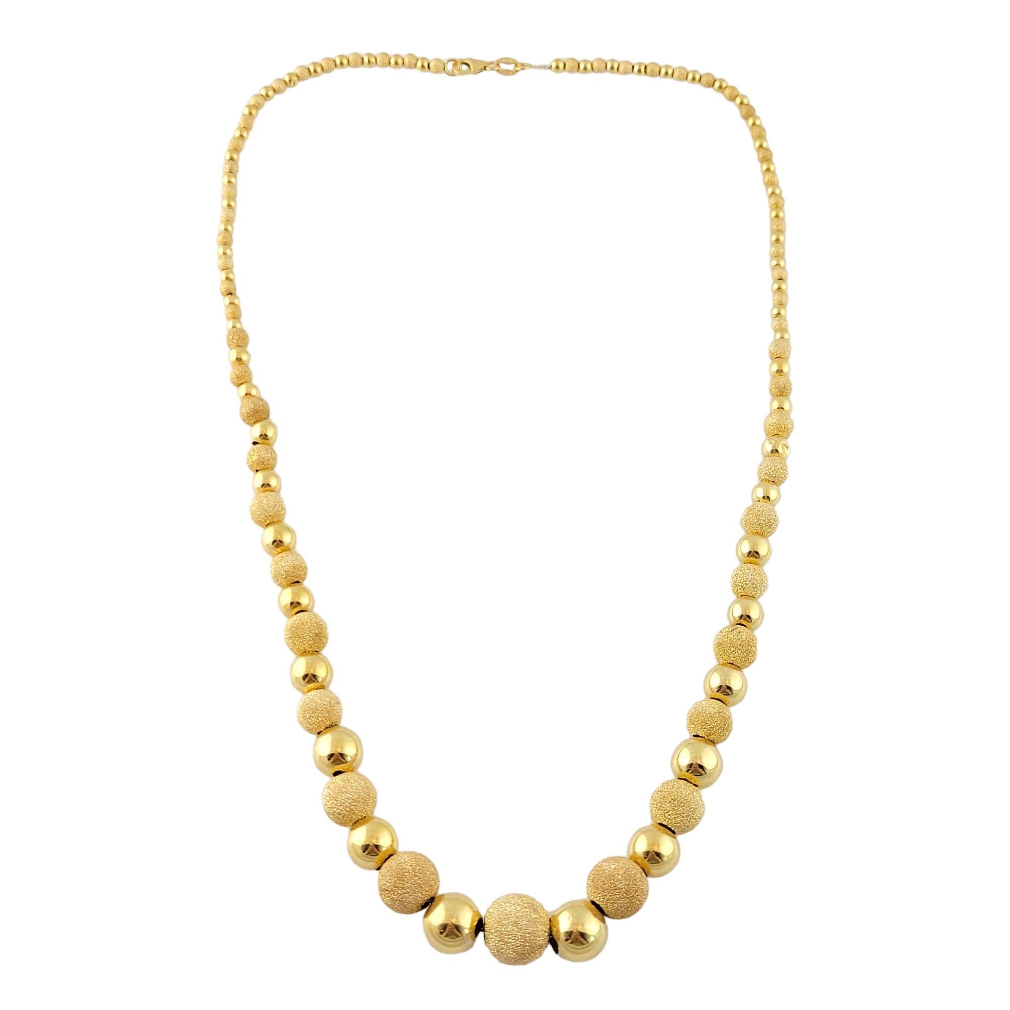 Vintage 14K Yellow Gold Textured Ball Necklace

This gorgeous 14K gold necklace is decorated with textured, gold, sparkly balls around the chain!

Size: 17.5