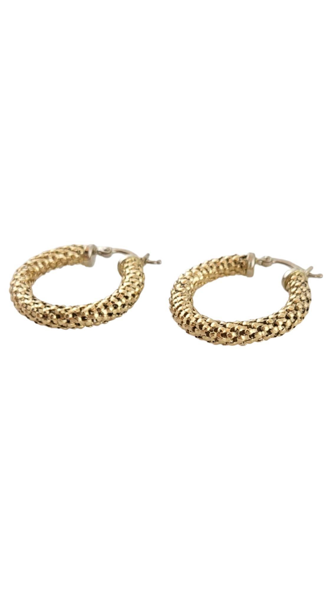 Vintage 14K Yellow Gold Textured Hoops

This gorgeous set of hoop earrings are textured to perfection!

Size: 26.8mm X 24mm X 4.1mm

Weight: 4.63 g/ 3.0 dwt

Hallmark: 14K ITALY

Very good condition, professionally polished.

Will come packaged in a