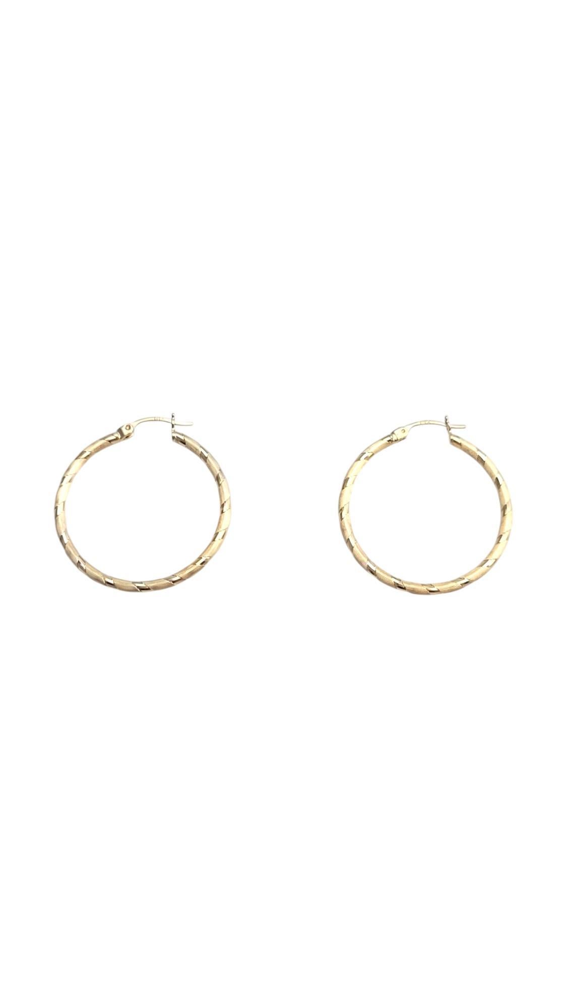 14K Yellow Gold Textured Hoop Earrings

These meticulously designed thin hoop earrings are beautifully finished in 14K yellow gold. Get ready to shine with these hoop earrings!

Hallmark: 14K

Weight: 3.4 g / 2.22 dwt.

Size: 31.6 mm X 2.0 mm X 2.0