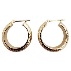 Boucles d'oreilles créoles texturées en or jaune 14 carats #25536