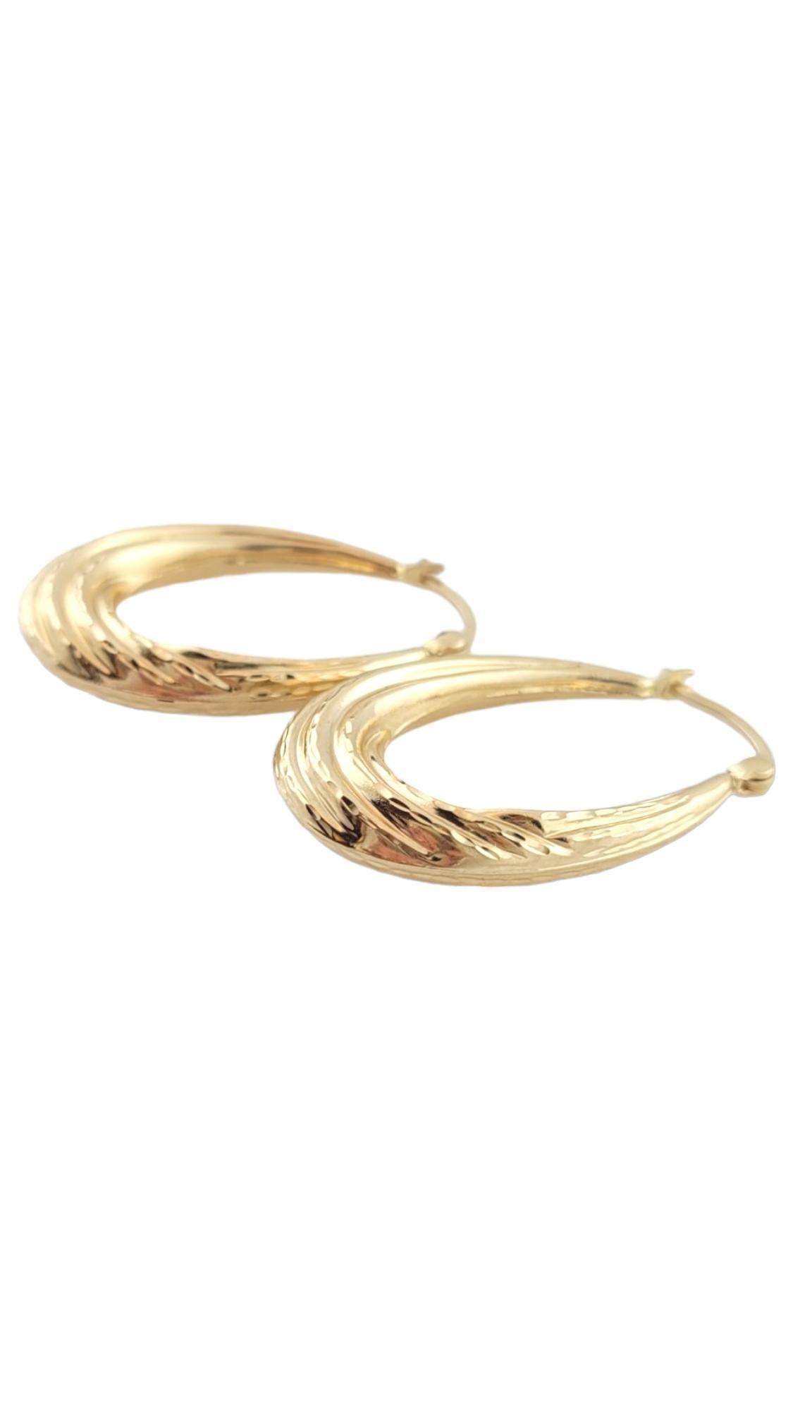 Vintage 14K Yellow Gold Textured Oval Hoop Earrings

This gorgeous set of oval hoop earrings have a beautiful textured finish!

Size: 30.6mm X 20.2mm X 5.2mm

Weight: 1.5 dwt/ 2.4 g

Hallmark: SLC 14K

Very good condition, professionally