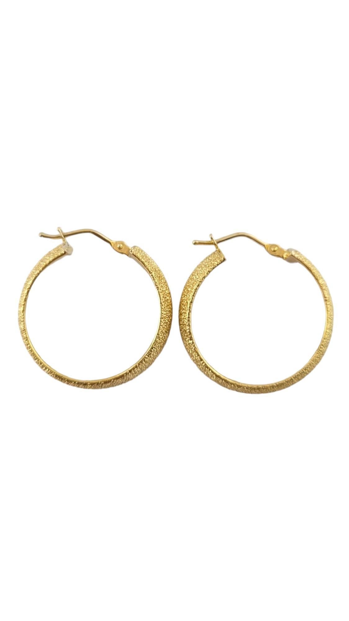 14K Yellow Gold Textured Sparkly Hoop Earrings

This beautiful set of 14K gold textured hoops will look gorgeous on anybody!

Diameter: 23.71mm
Width: 7.8mm'

Weight: 2.16 dwt/ 3.36 g

Hallmark: 14KT ITALY

Very good condition, professionally