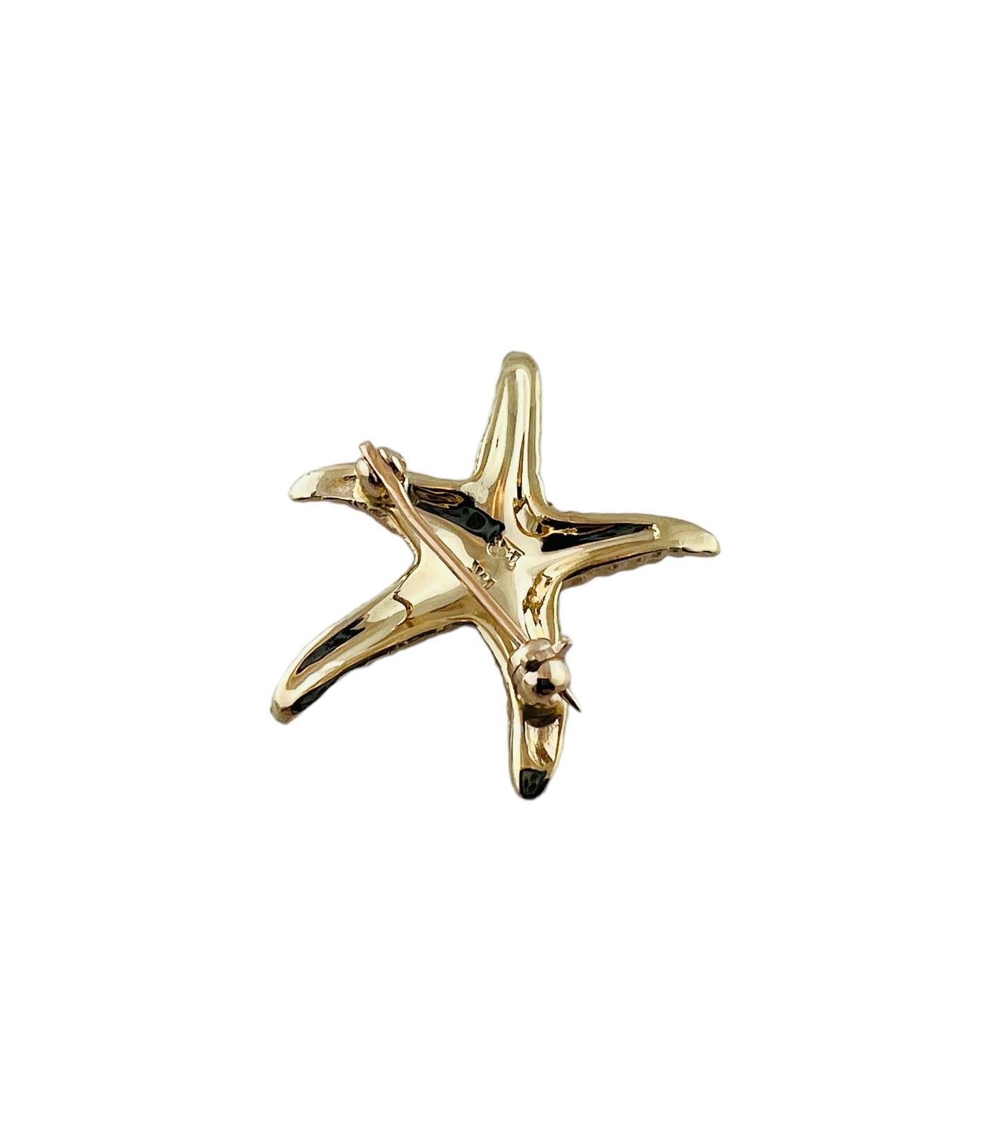 14K Yellow Gold Textured Starfish Pendant

This beautiful starfish pin is set in 14K yellow gold

Pin measures approx. 26.9 mm x 23.0 mm x 2.9 mm 

4.2 grams / 2.7 dwt

Stamped 14K

Very good preowned condition. 

Will be shipped priority mail with