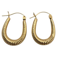 Boucles d'oreilles en or jaune 14K en forme de U texturé #25103