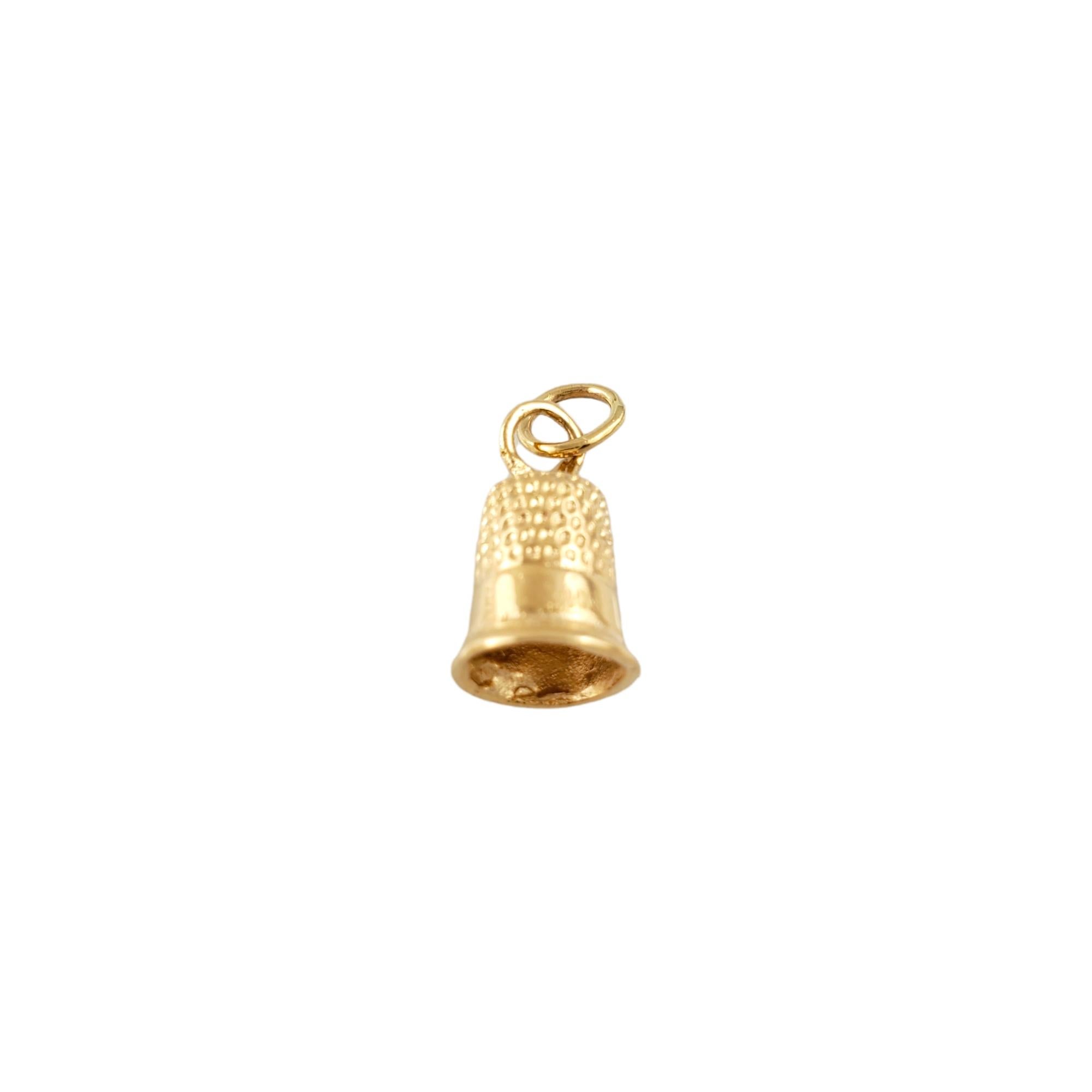 14K Yellow Gold Thimble Charm 

Beautiful vintage 14K yellow gold thimble charm!

Size: 14.75mm X 8.45mm

Weight: 1.6 gr /  1.0dwt

Hallmark: 14K 

Very good condition, professionally polished.

Will come packaged in a gift box and will be shipped