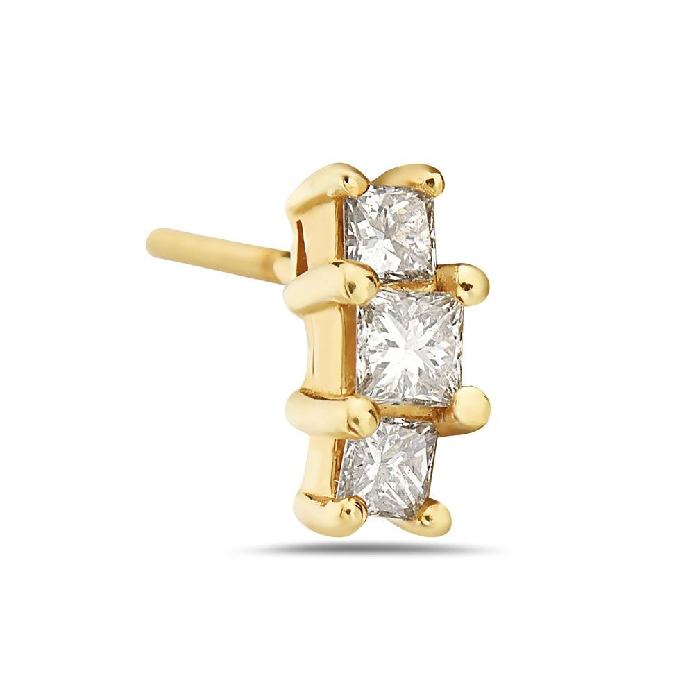 These three stone stud earrings feature 0.56 carats of princess cut diamonds set in yellow gold. Made in USA. 

Viewings available in our NYC showroom by appointment.