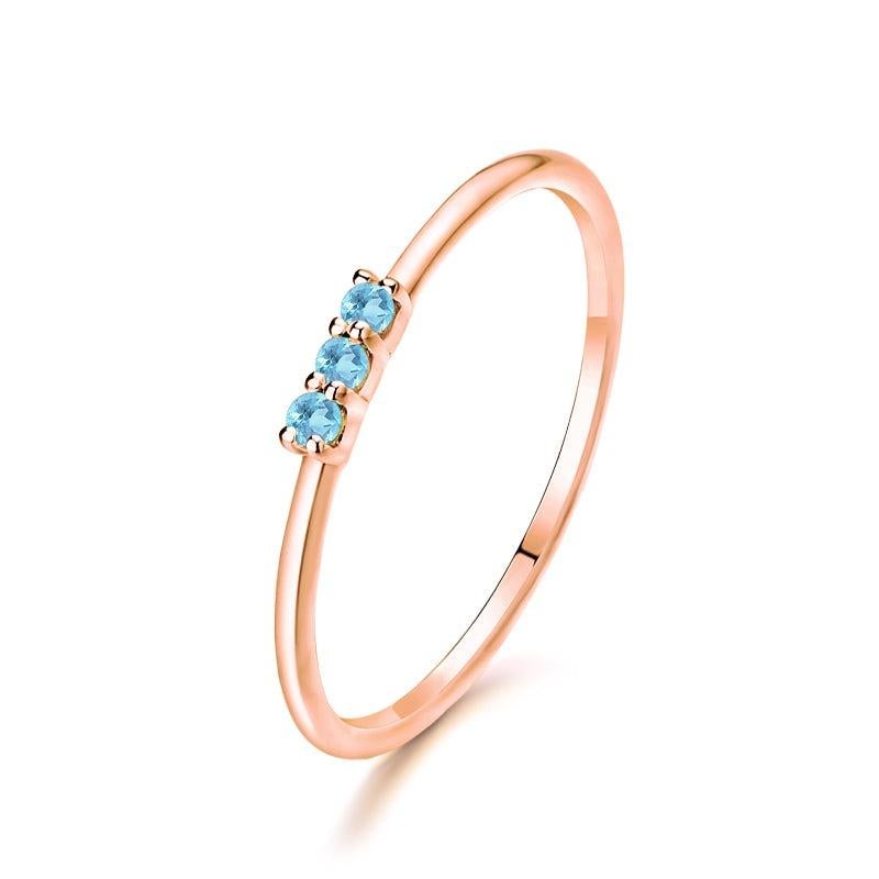 For Sale:  Trilogy Round Aquamarine 14K Rose Gold Ring 4