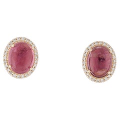 Clous d'oreilles en or jaune 14 carats avec tourmaline cabochon ovale et diamants