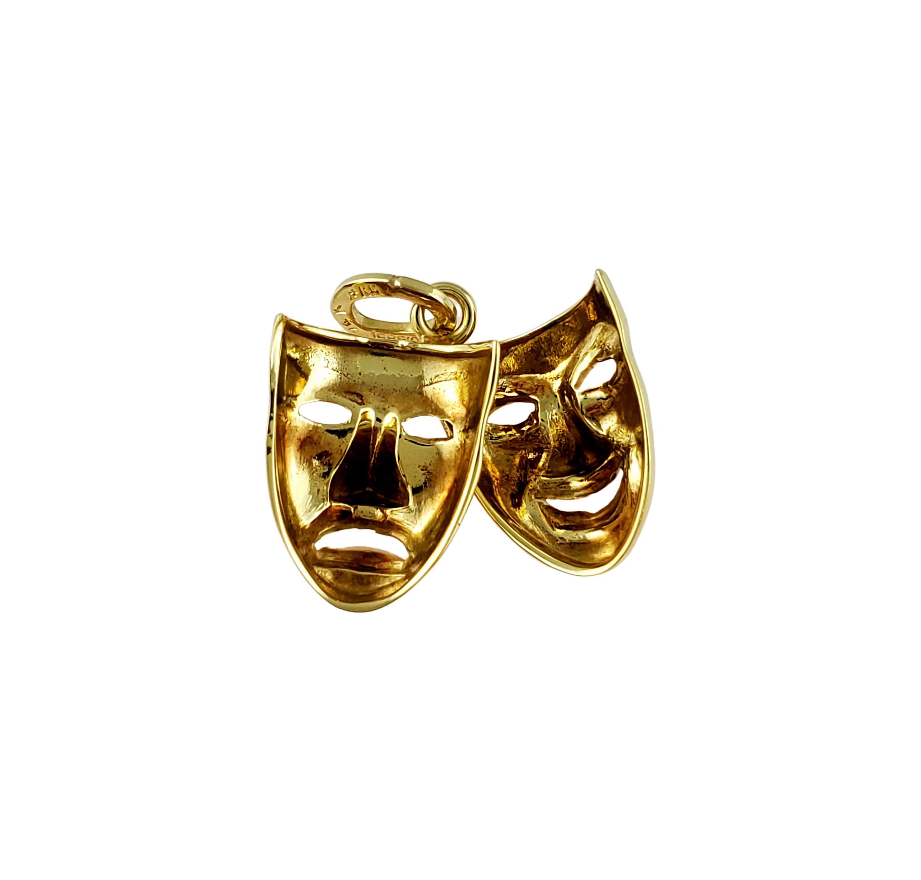 14K Yellow Gold Tragedy & Comedy Mask Charm

Beautiful 14K yellow gold tragedy & comedy mask charm depicts happy and sad emotions. These masks are used in the representation of theater, acting, and drama. These exaggerated emotion masks were used in