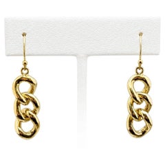 Pendientes colgantes de tres eslabones en oro amarillo de 14 quilates