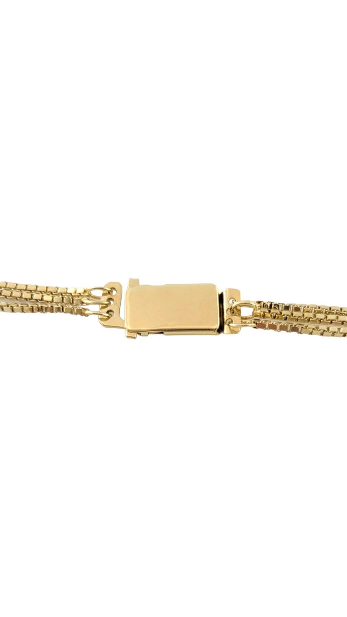 Vintage 14K Yellow Gold Triple Strand Box Chain Necklace

This gorgeous 14K gold necklace features 3 strands of box chains for a gorgeous final look!

Length: 17.5