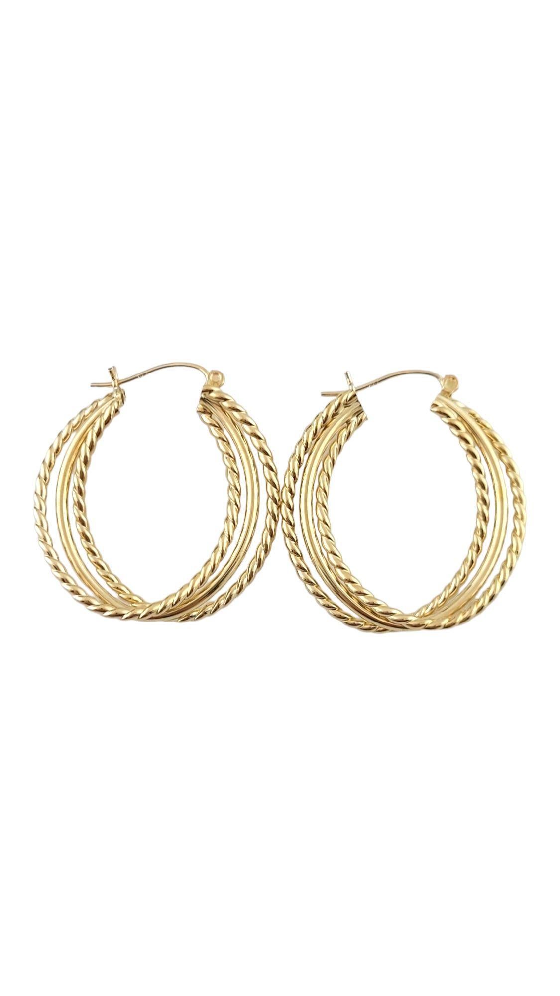 Vintage 14K Yellow Gold Triple Textured Hoop Earrings

These gorgeous 14K yellow gold triple hoops have a beautiful textured pattern!

Size: 32.4mm X 30.6mm X 5.8mm

Weight: 4.90 g/ 3.2 dwt

Hallmark: 14K

Very good condition, professionally