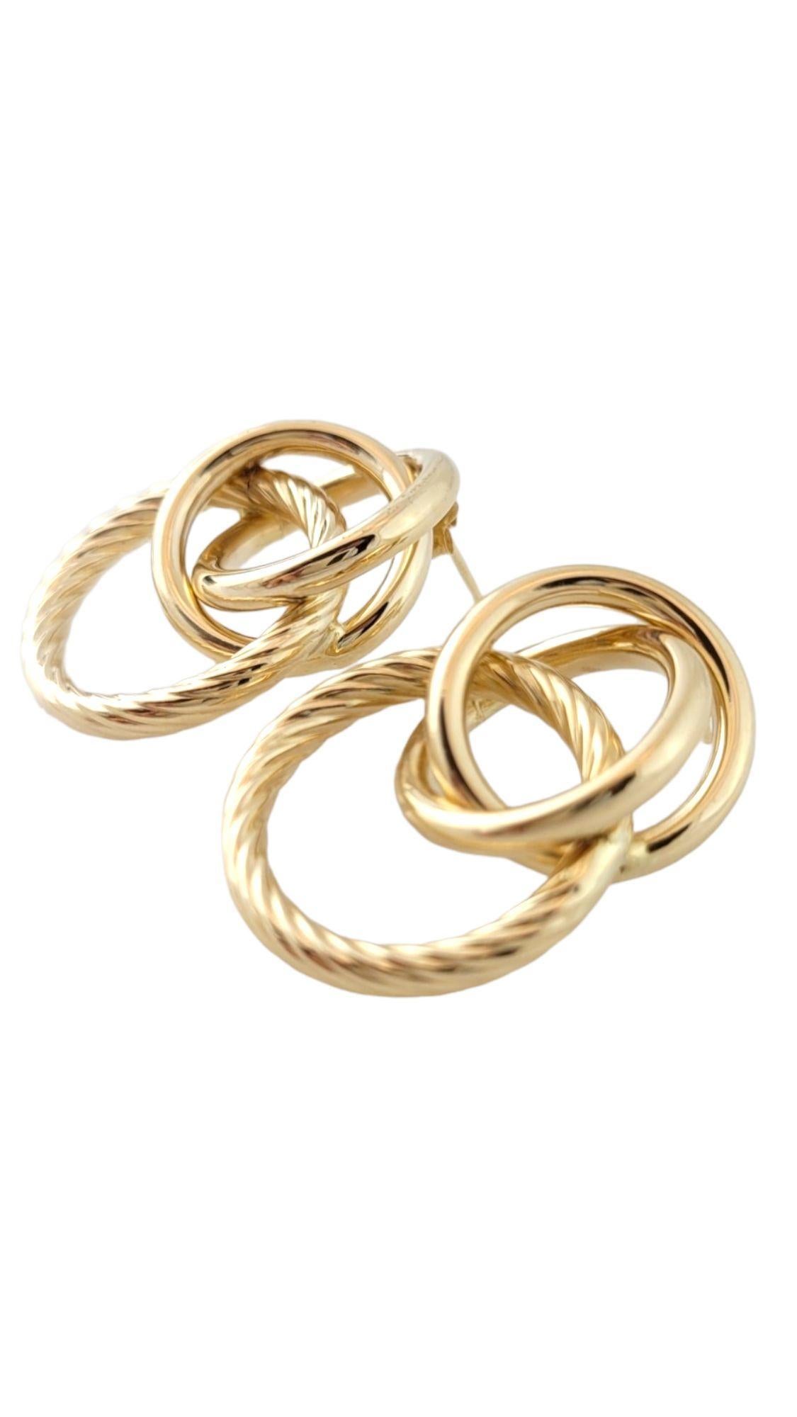 Vintage 14K Yellow Gold Triple Twisted Circle Drop Earrings

This beautiful set of triple twisted circle earrings are crafted from 14K yellow gold!

Size: 29.9mm X 21.8mm X 8.9mm

Weight: 5.06 g/ 3.3 dwt

Hallmark: 14K

Very good condition,