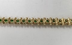 14 Karat Yellow Gold Tsavorite and Bar Bracelet