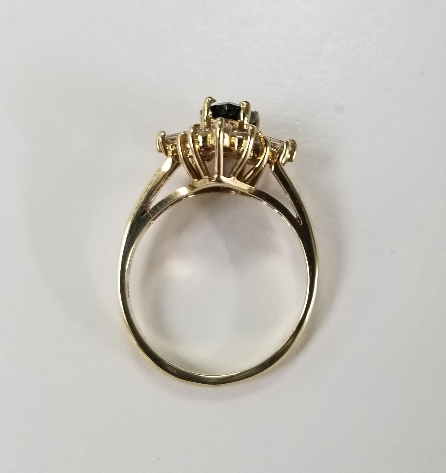 Pear Cut 14 Karat Yellow Gold Tsavorite and Diamond Ring
