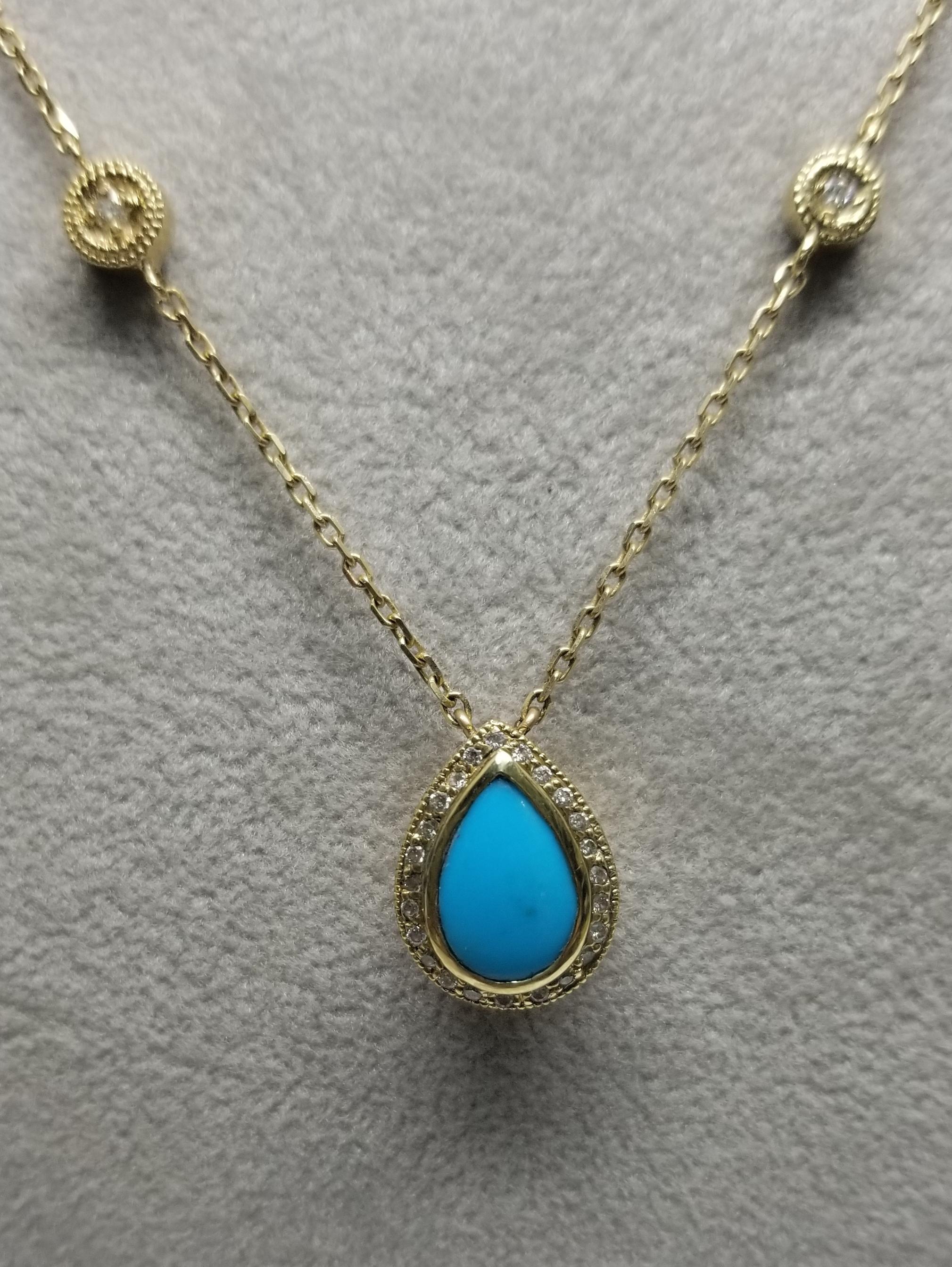 14K Yellow gold turquoise and diamond halo necklace, containing  1 turquoise 1.95cts. pear shape and 41 round full cut diamonds of very fine quality weighing .90pts. the diamonds accents on the chain are 2 sided at 18.5 inches.